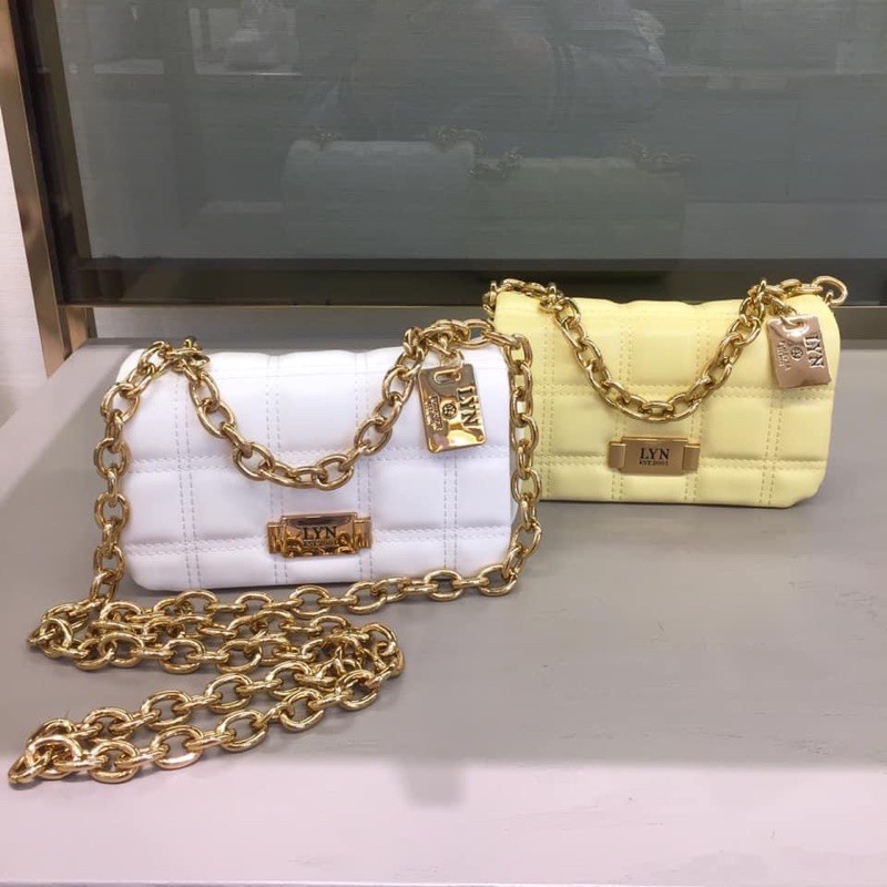 Túi lyn đeo chéo khoá xoay