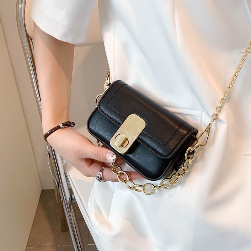 Túi đeo chéo mini khoá xoay phối xích màu vàng hàng hot mẫu mới