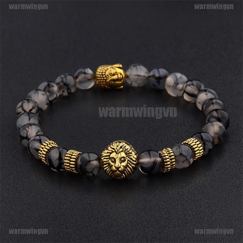 Vòng tay đá dung nham đen cùng hạt cườm hình Phật và sư tử màu vàng ingvn