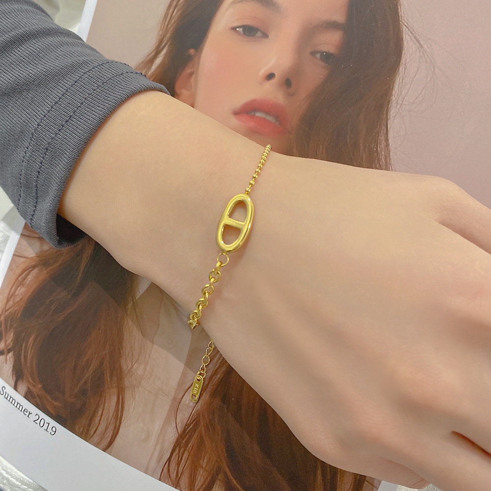 Vòng đeo tay thép titan mạ vàng 18K thiết kế mũi heo đẹp đơn giản bất đối xứng làm quà tặng sinh nhật cho bạn gái