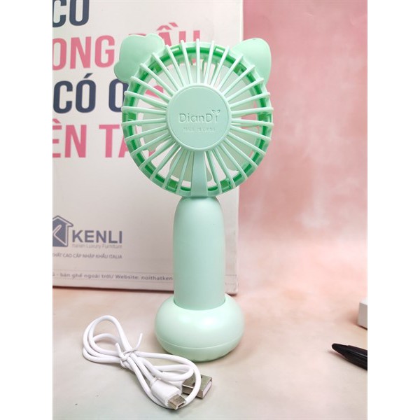 Quạt Mini Cầm Tay 2 Tốc Độ Gió, Kèm Đế Tròn Để Bàn, Có Đèn Led Và Usb Cắm Sạc  Có Nơ - Màu Xanh Ngọc