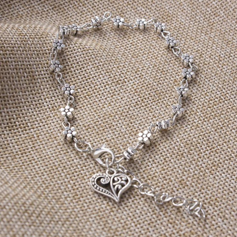 Lắc chân hình hoa mai nhỏ nhắn gắn hình trái tim rỗng dễ thương cho nữ LC101 | BigBuy360 - bigbuy360.vn