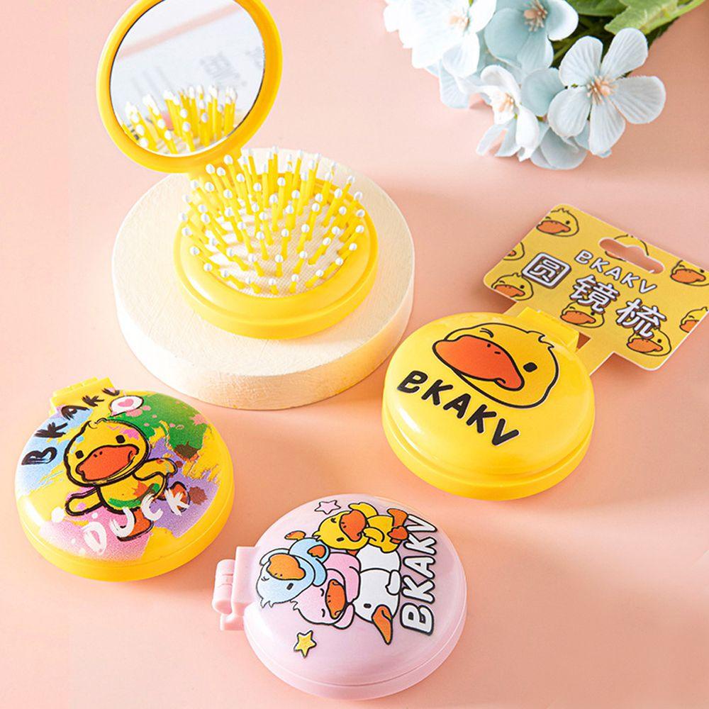 Lược Chải Tóc Dạng Gập Túi Khí Mềm Chất Lượng Cao Có Gương Hình Vịt Vàng Hoạt Hình Cho Nữ