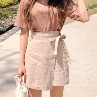 Chân váy buộc nơ vạt lệch