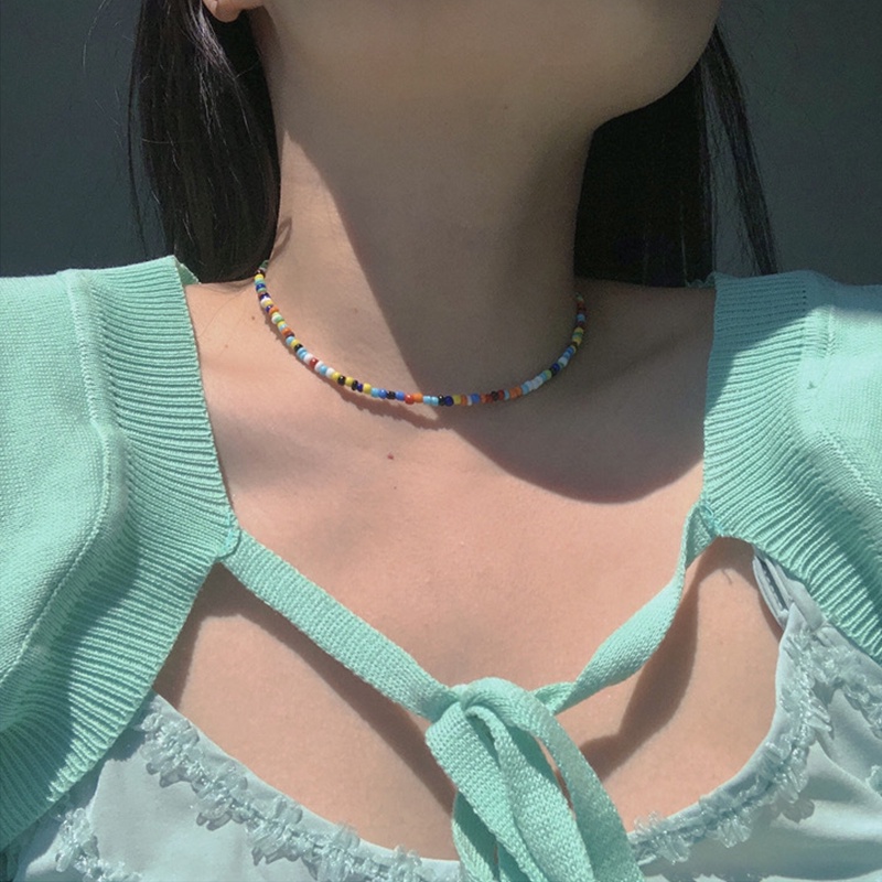 Vòng cổ hai lớp đính hạt ngọc trai và kính hình hoa cúc
