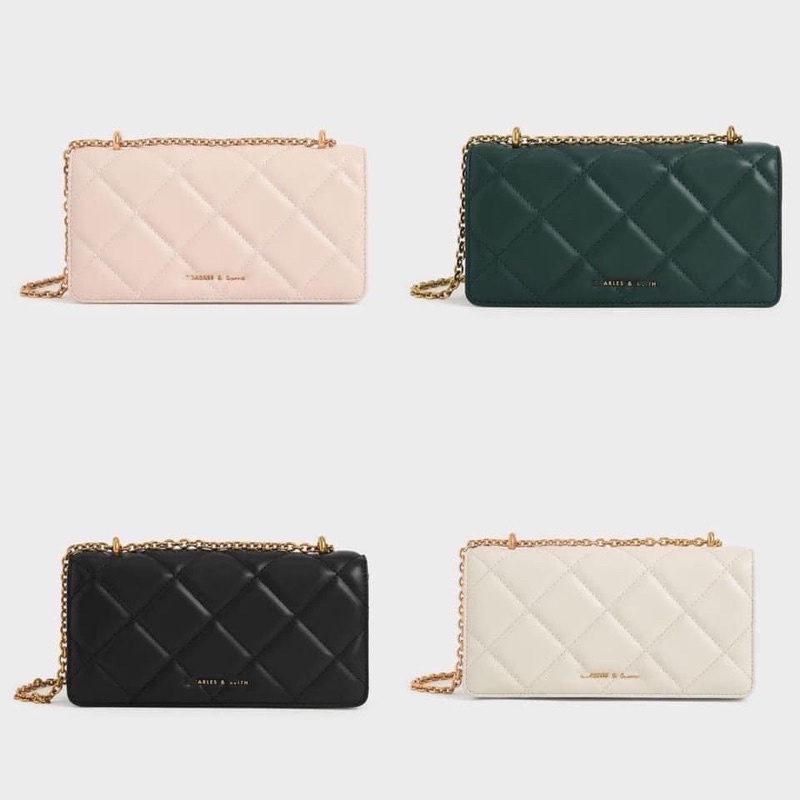 Túi dạng clutch trám ô da lì