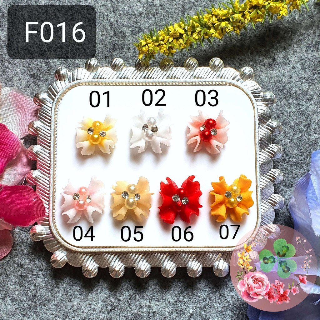 Mẫu: F016 . Hoa bột &quot;Nơ trai&quot; đính móng siêu xinh.