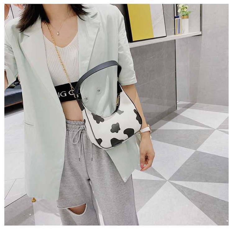 Túi kẹp nách xách nữ họa tiết bò sữa unisex form chuẩn da bóng, túi bò sữa đeo vai