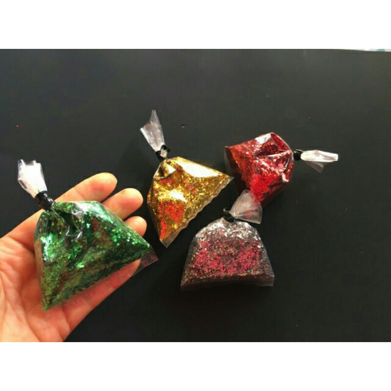 Nhũ kim tuyến rắc trên quả màu vàng, bạc, đỏ , xanh lá (1 gói như hình)