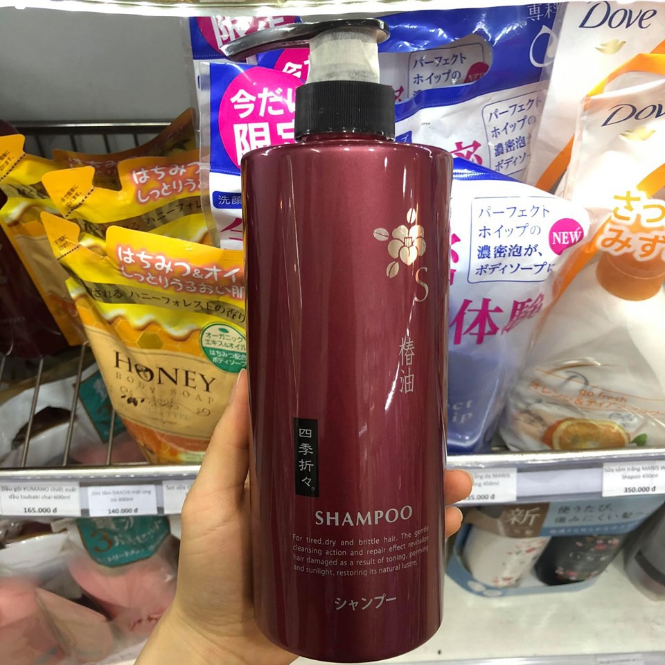 Dầu gội KUMANO chiết xuất dầu tsubaki chai 600ml dành cho tóc hư tổn và khô xơ