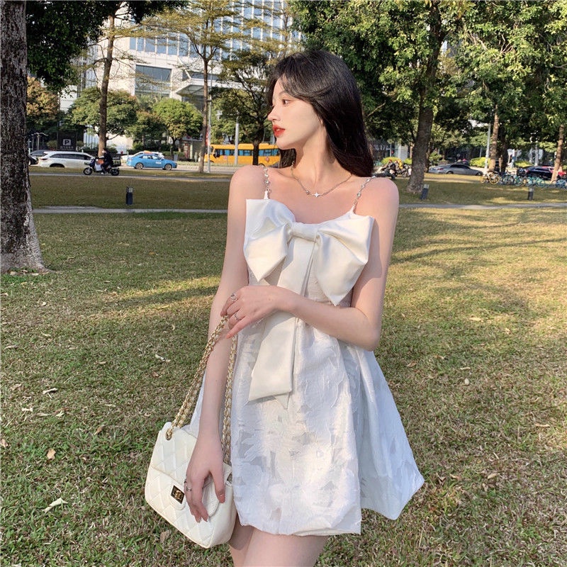 Đầm Hai Dây Phối Nơ Nhỏ Phong Cách Pháp Ngọt Ngào Thời Trang Mùa Hè Mới Dành Cho Bạn Nữ