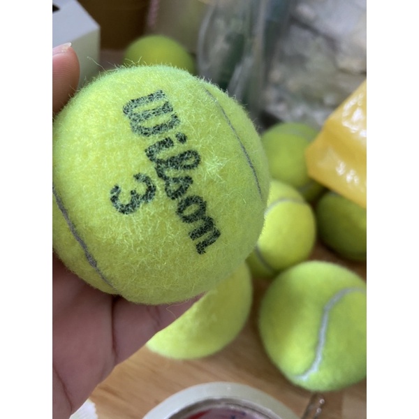 Độ mới 80-90% Banh Tennis Bóng Tennis ( hoặc làm đồ chơi cho chó mèo )giá rẽ chất lượng tốt .Mua 4 trái kèm 1 hộp Wilson