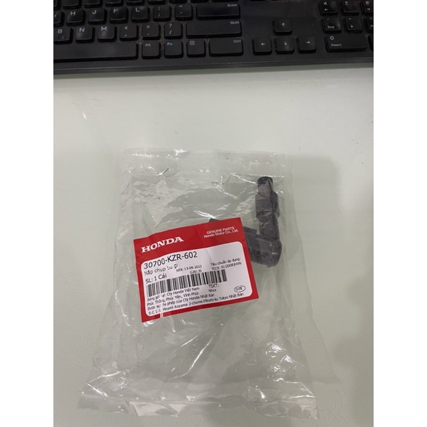 Nắp chụp bu gi SH MODE . LEAD 125 chính hiệu honda