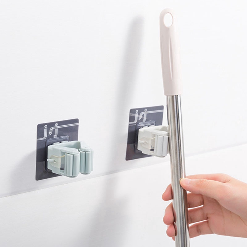 Móc dán tường hỗ trợ giữ cây lau nhà tiện dụng