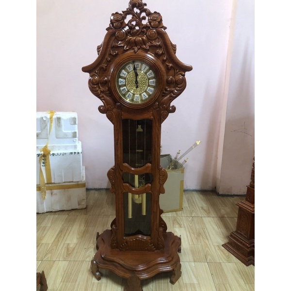 Đồng hồ cây đàn kích thước cao 175 cm sâu 75 cm gỗ hương đá .