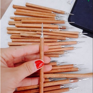 Cây lấy khóe móng cán gỗ