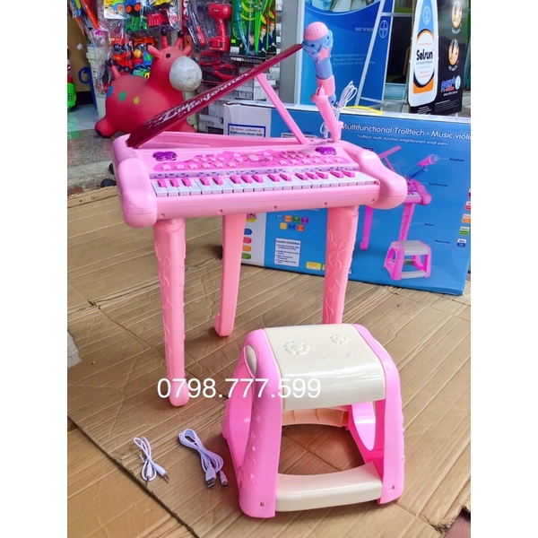 đàn piano có ghế và micro loại đẹp lớn