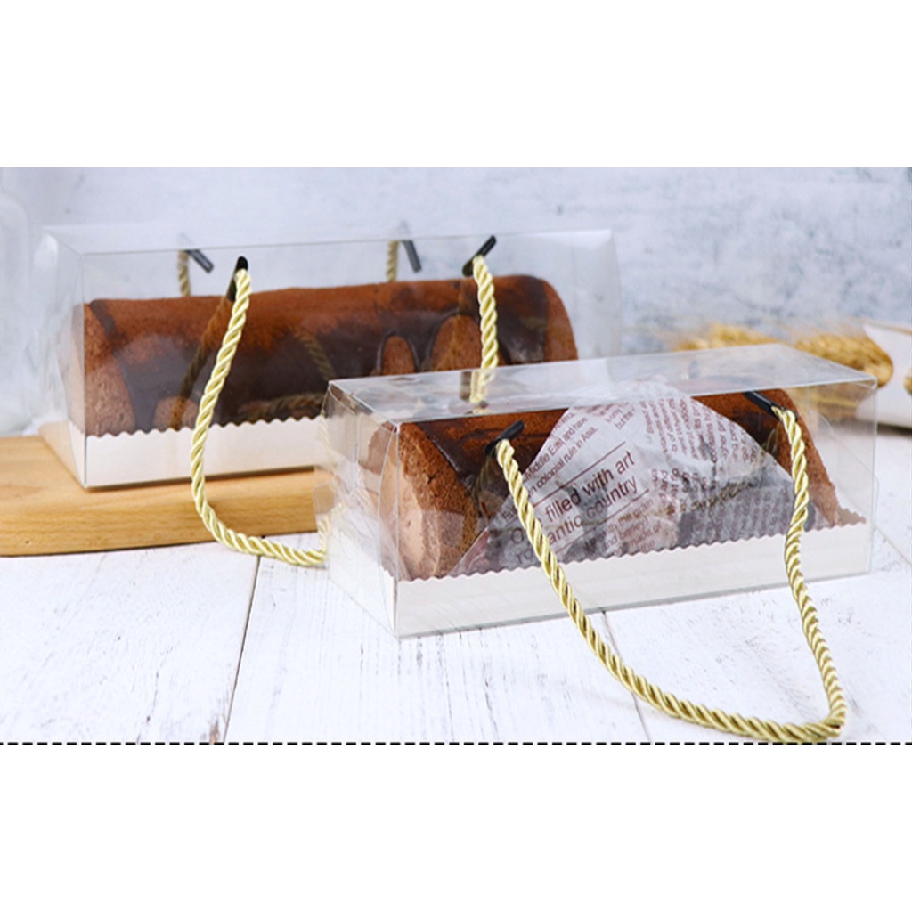 5 cái hộp mica trong suốt chữ nhật dài có dây vàng dùng để đựng bánh cuộn