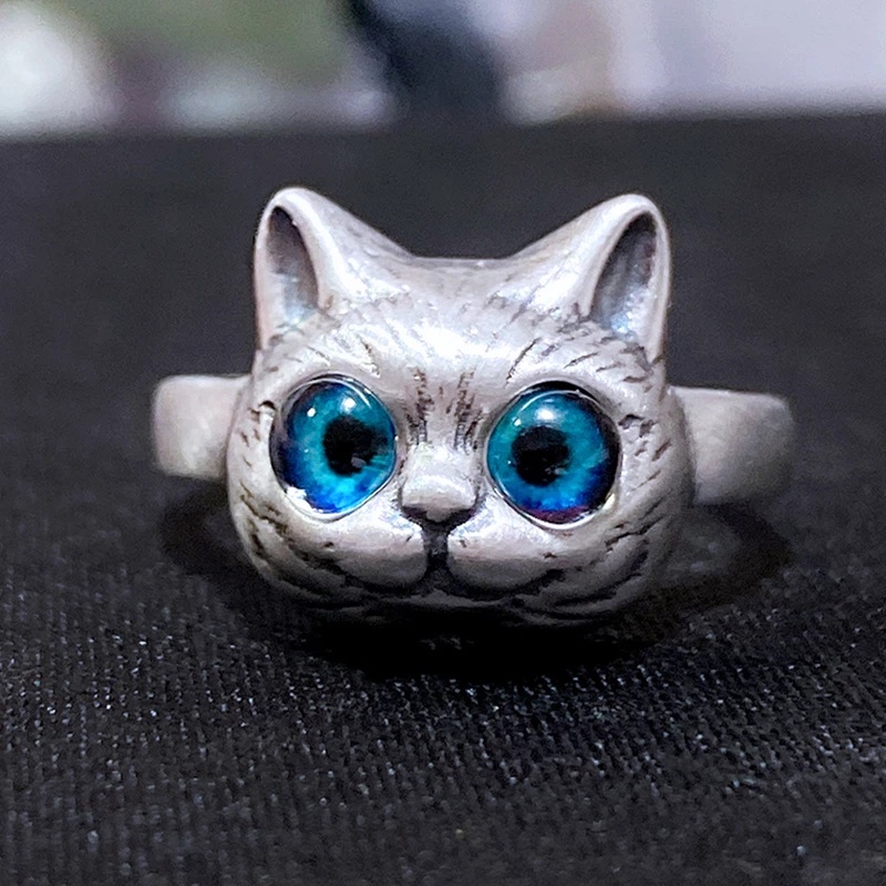 Nhẫn Đeo Tay Kim Loại Hình Mắt Mèo Thời Trang Unisex