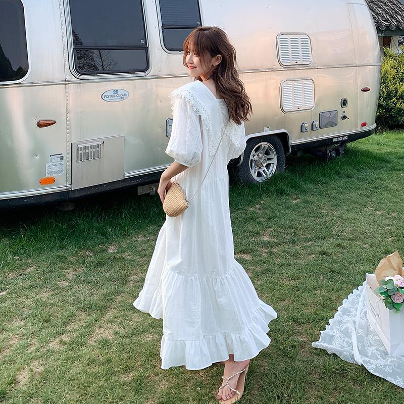 Đầm dáng rộng màu trắng dài hơn đầu gối thời trang cho nữ