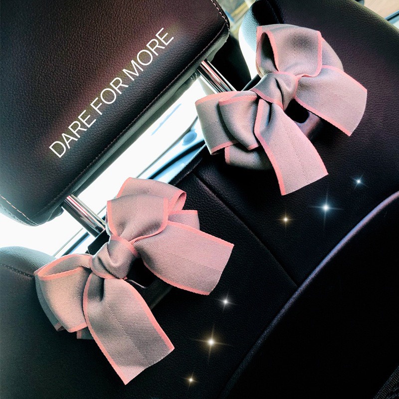 Móc treo đồ sau ghế xe ô tô - Móc treo đồ xe hơi hình nơ