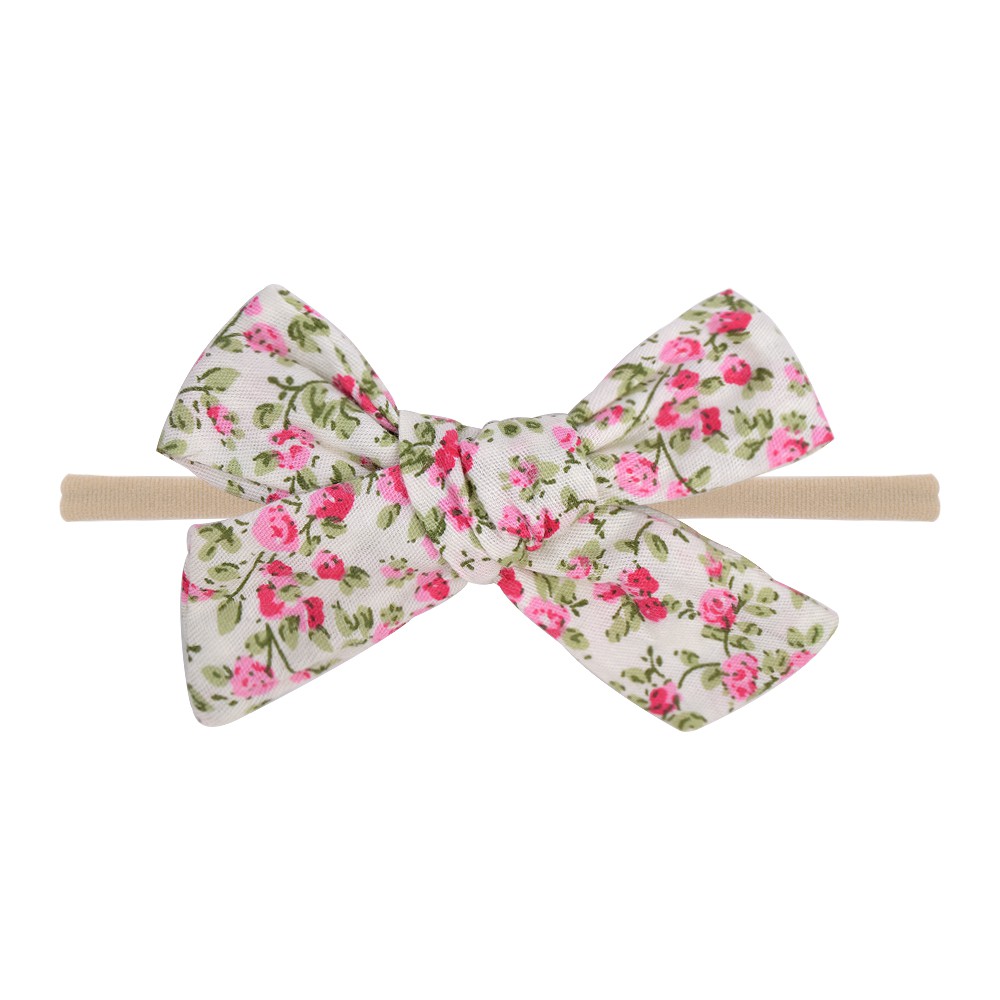Băng đô KIDSBOWS đính nơ in hoa xinh xắn cho bé gái