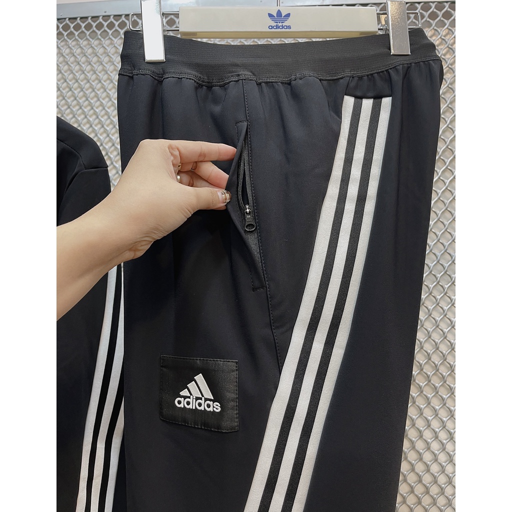 Bộ thể thao adidas gió 3 sọc chéo