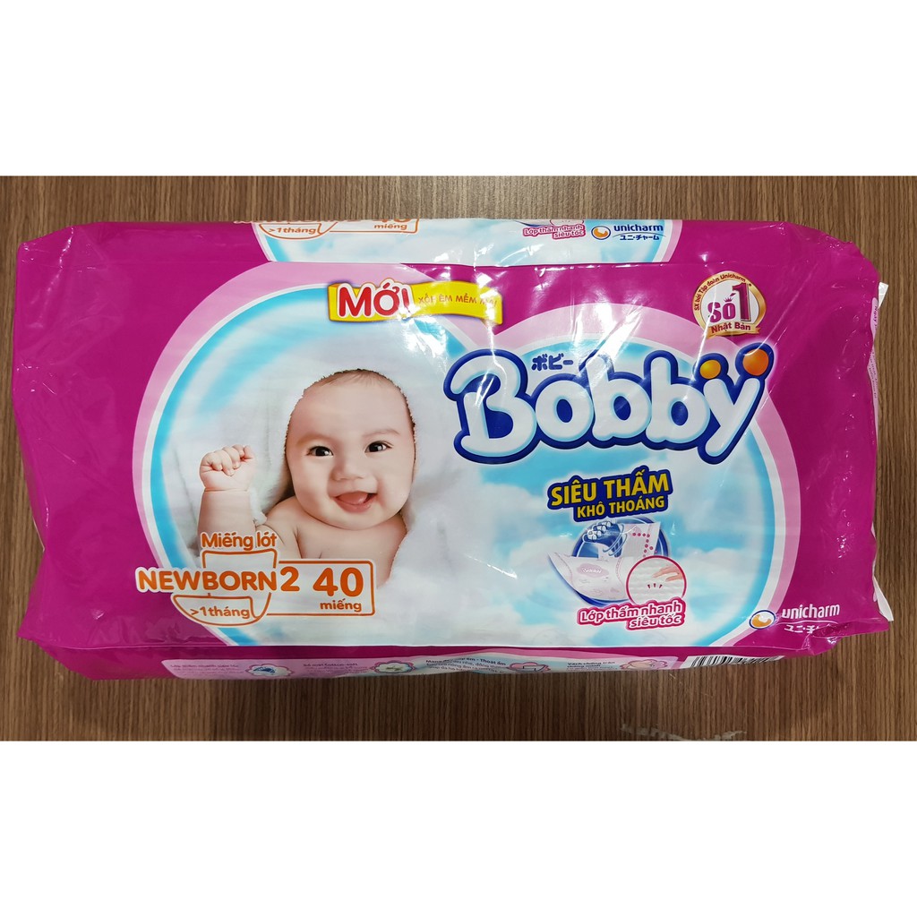 MIẾNG LÓT SƠ SINH BOBBY NEWBORN 1 64 MIẾNG - NEWBORN 2 40 MIẾNG