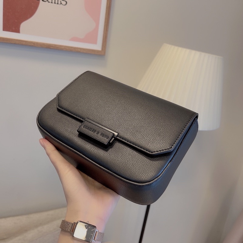 Túi nắp bấm full tag đen