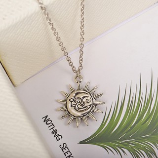 Vintage style moon and sun pendant