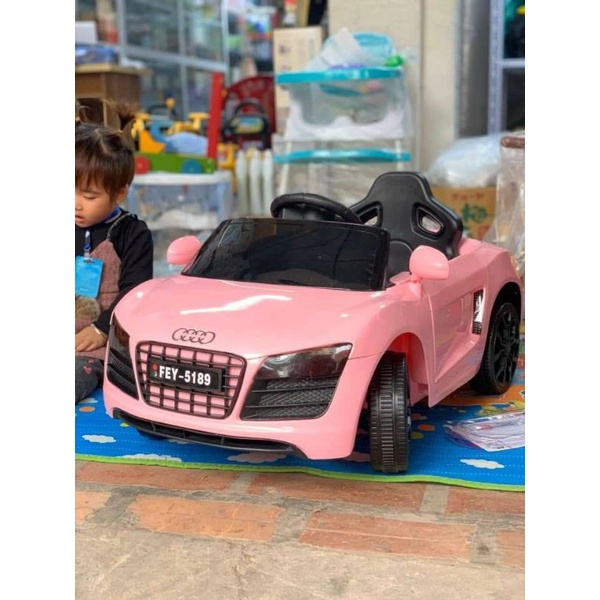 Ô tô điện mini kiểu đang BMW( có điều khiển từ xa, chế độ tự đạp ga lái, đèn, còi, nhạc, cổng Usb tích hợp...)