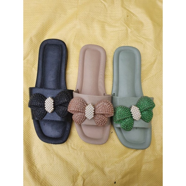 Dép nữ quai ngang đế nhựa dẻo mềm êm chân có gắn nơ dễ thương.