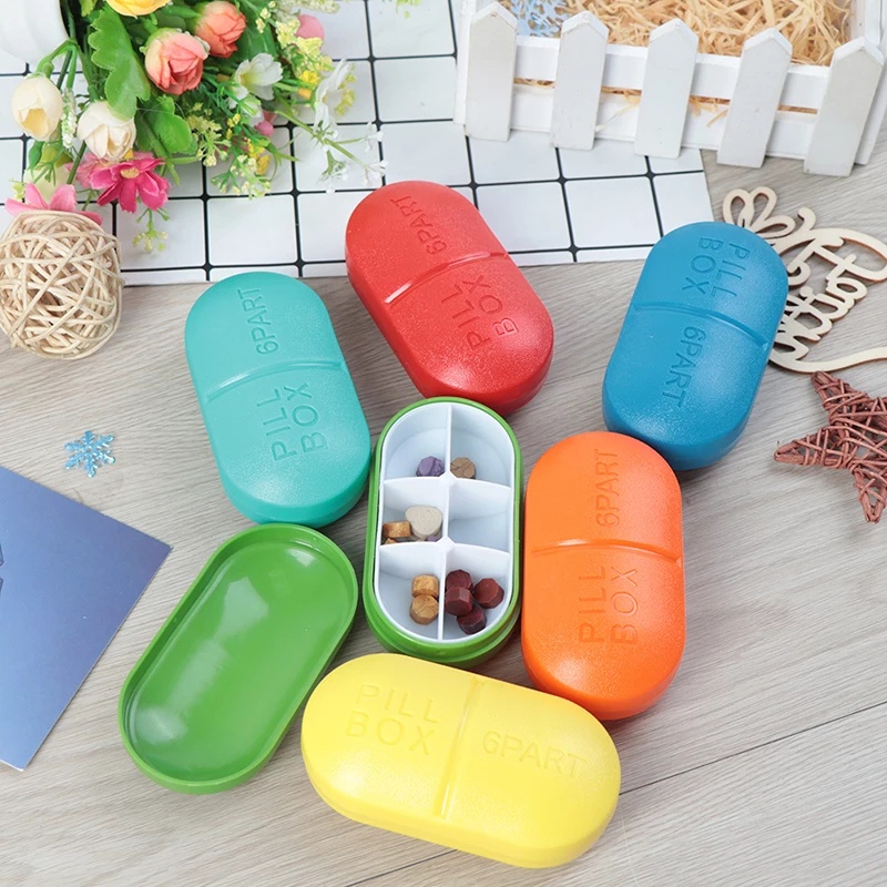1 hộp đựng thuốc mini bằng nhựa gồm có 6 ngăn