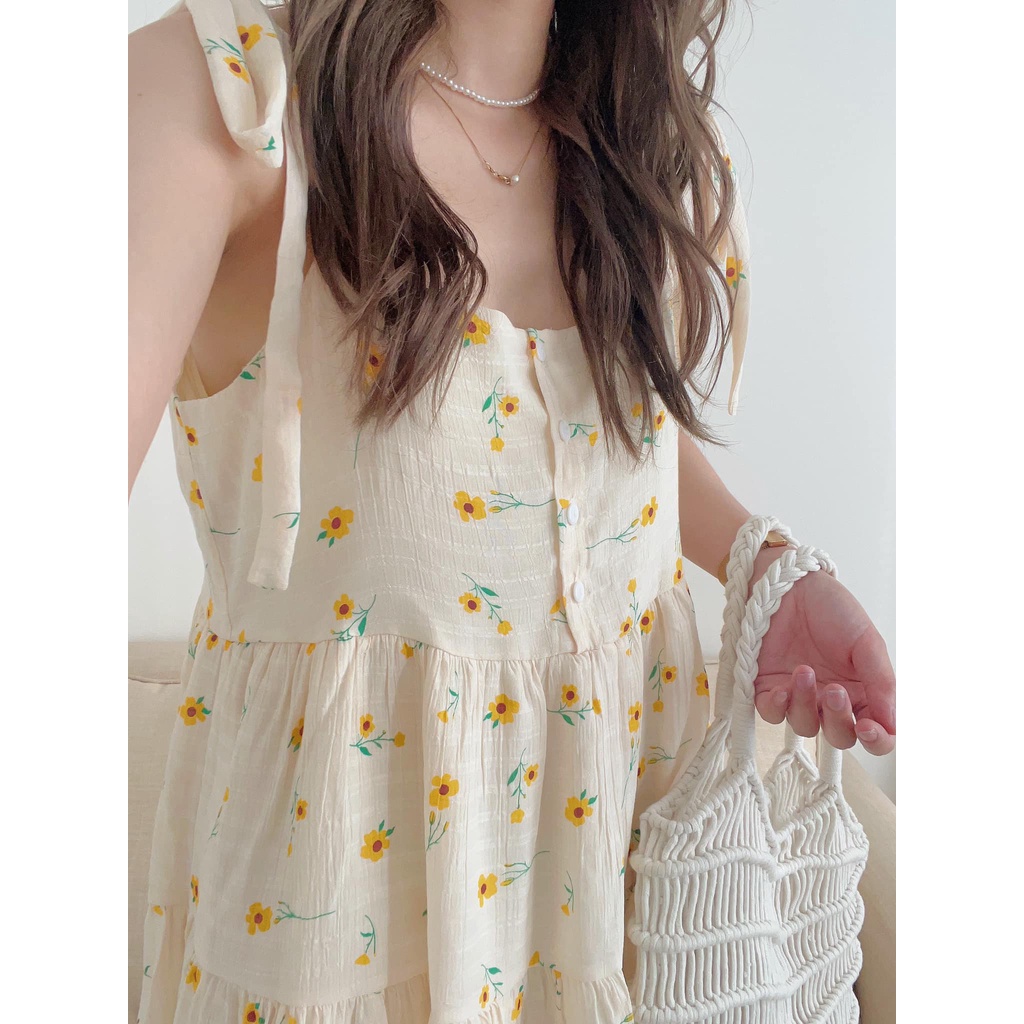 Váy 2 dây nơ vai hoa cúc vàng đũi mềm xinh xắn - Đầm maxi đi biển 2 dây hoa cúc vàng dáng xoè tầng Kozoda D74