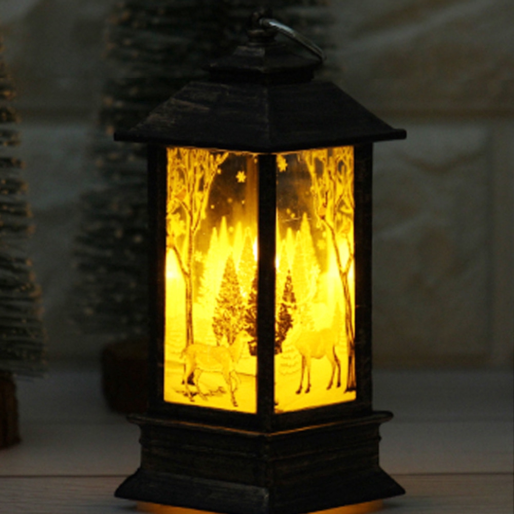 Đèn LED kiểu nến tealight dùng để trang trí Giáng Sinh chất liệu PVC và Acrylic chạy bằng pin AAA