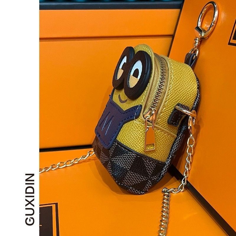 Túi xách cho bé đeo chéo túi minion nhỏ nhắn đáng yêu chất liệu da xịn dây xích đeo chéo jimado