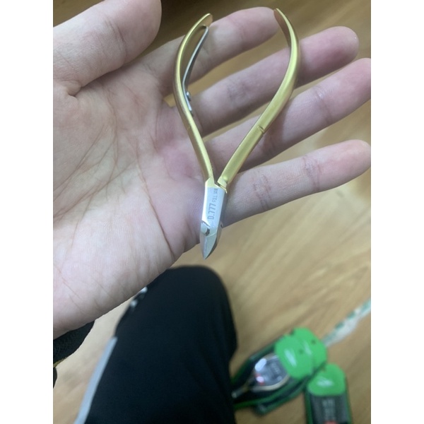 Kềm nghĩa cắt da d777 mạ vàng, Kìm nghĩa nhặt da D777