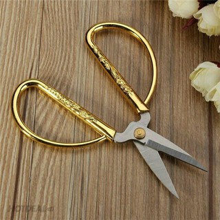 Kéo cắt gà cán rồng vàng