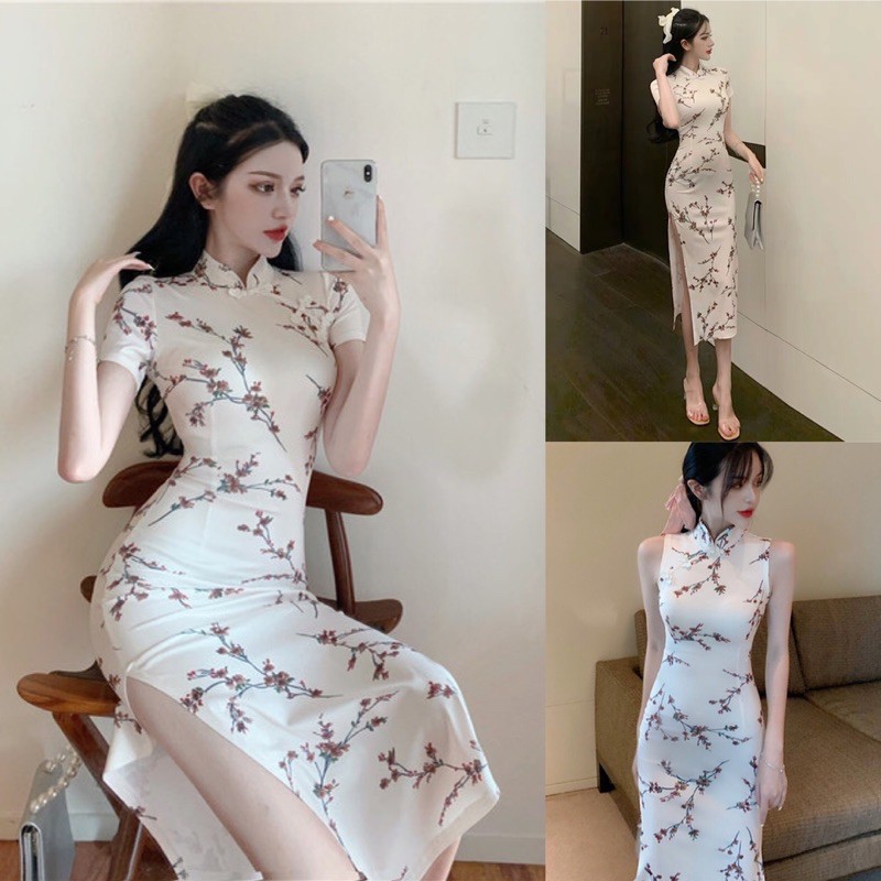 Sườn xám trắng hoa ôm body xẻ tà. Đầm body đi tiệc