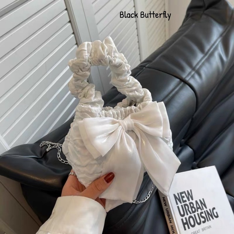 Túi đeo chéo đính nơ vải sần Butterfly