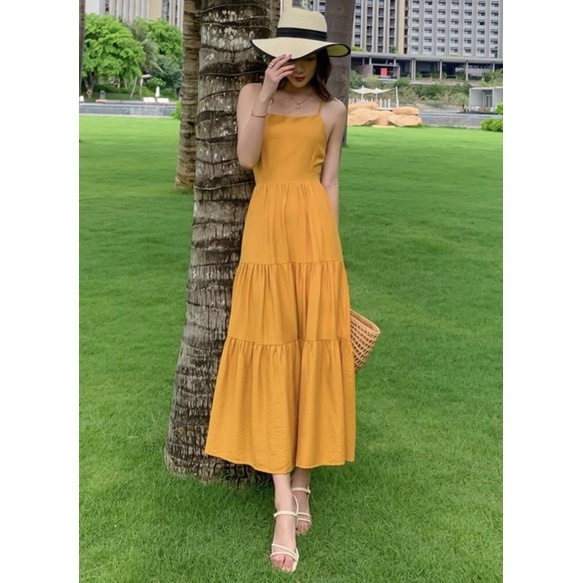 Đầm váy maxi vàng nghệ đan dây sau đi biển | BigBuy360 - bigbuy360.vn