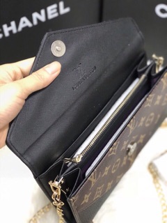 Clutch cầm tay Lv