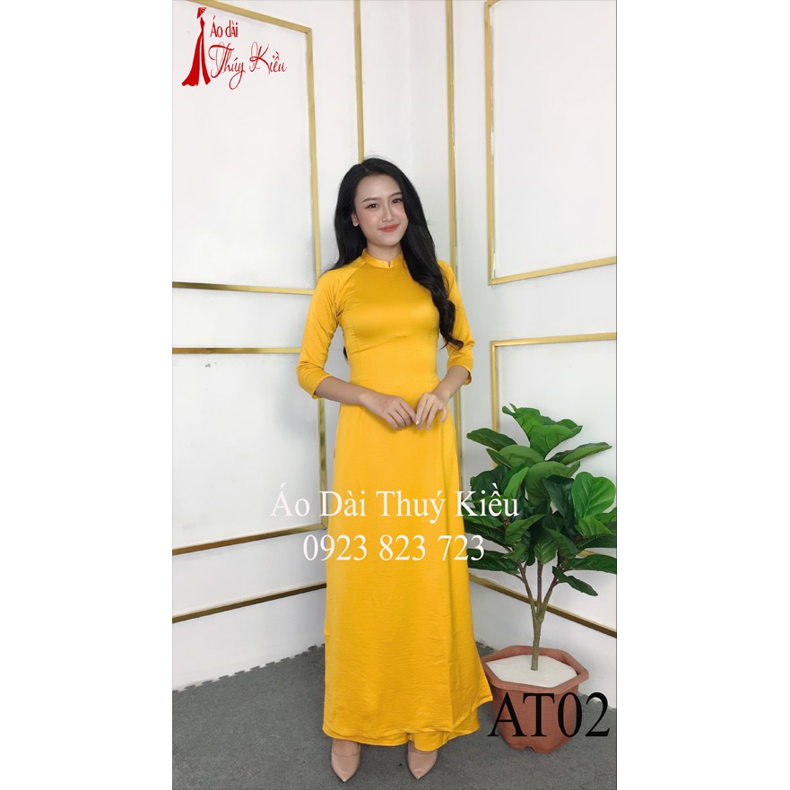 Áo dài Thúy Kiều trơn lụa Tây Thi cổ tàu màu vàng AT02