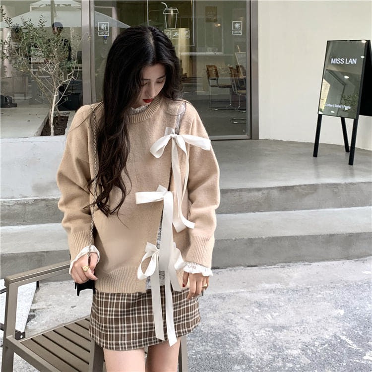 Áo len dáng thụng xẻ chéo buộc nơ ruy băng cá tính trẻ trung