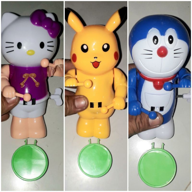 Một chú Mèo đánh trống lên dây cót bằng nhựa cao 14cm