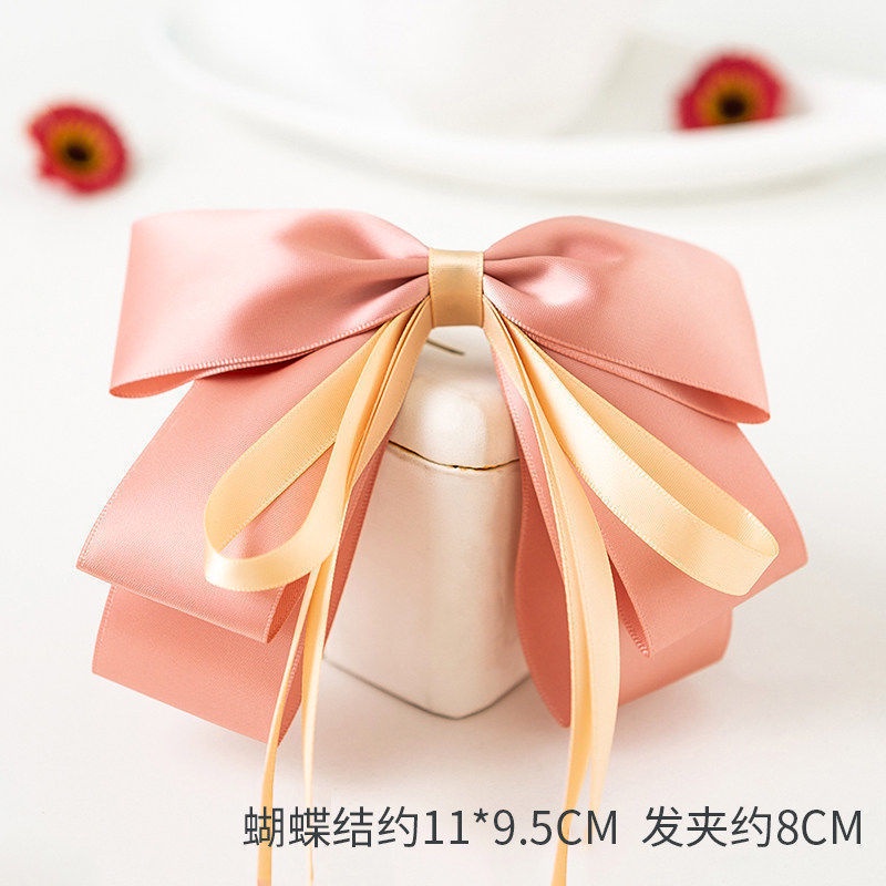 Kẹp tóc nơ nữ tính đơn giản và dễ thương