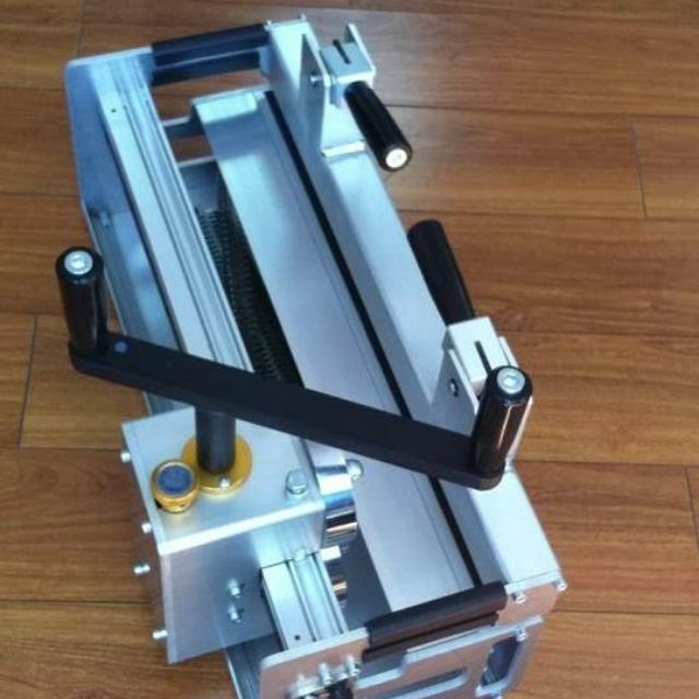 Máy ghim băng tải
