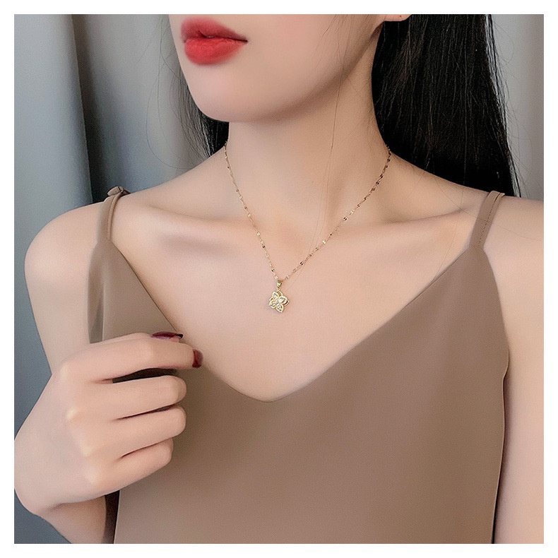 Vòng cổ thép titan mặt hình cỏ bốn lá có thể xoay vòng thời trang Hàn Quốc