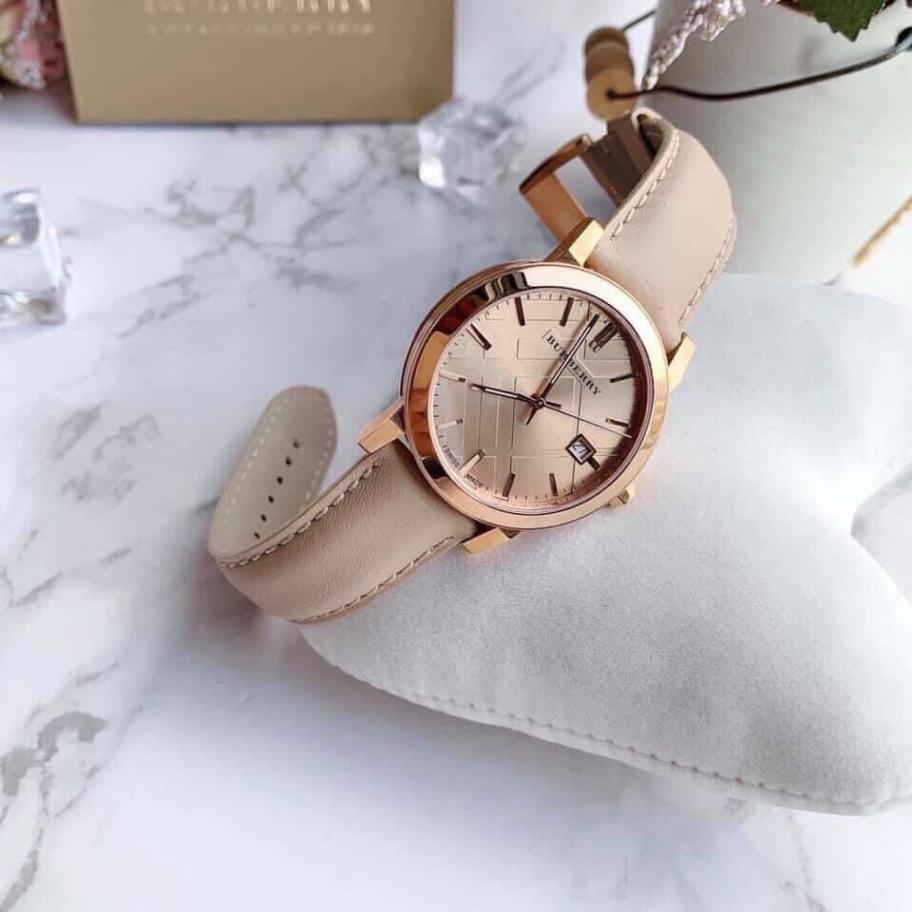 Đồng hồ nữ Burbery - thời trang, sang trọng, dây da mềm màu kem, mặt thép hồng siêu xinh,