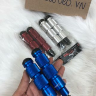 Gù chống đỗ xe máy